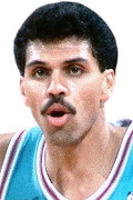 雷吉-托伊斯(Reggie Theus)